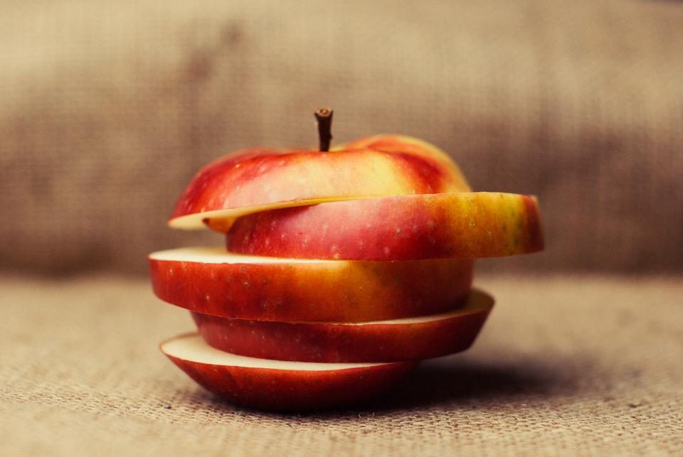Sliced apple on a rustic background