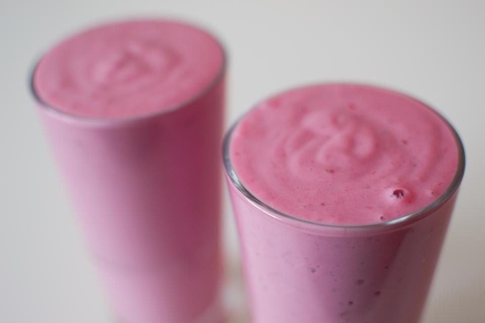 Two glasses of pink fruit smoothie