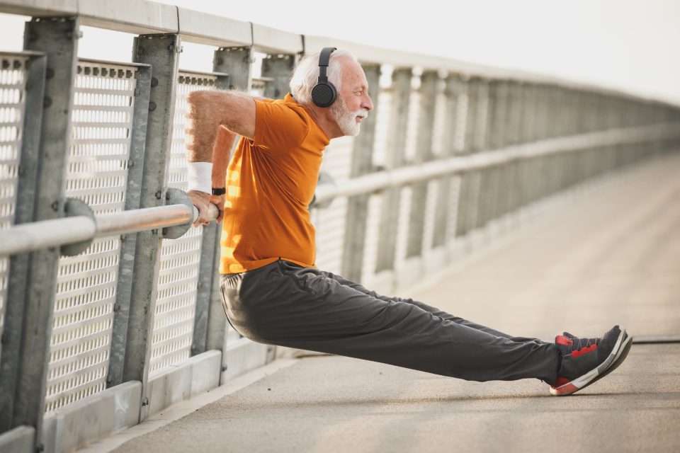Man doing bodyweight dips outdoors